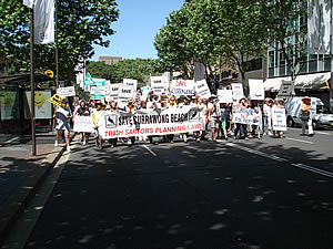 RAID protesters marching along macquarrie st to the NSW parliament house